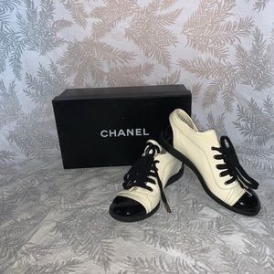 Chanel black and white lace up shoes